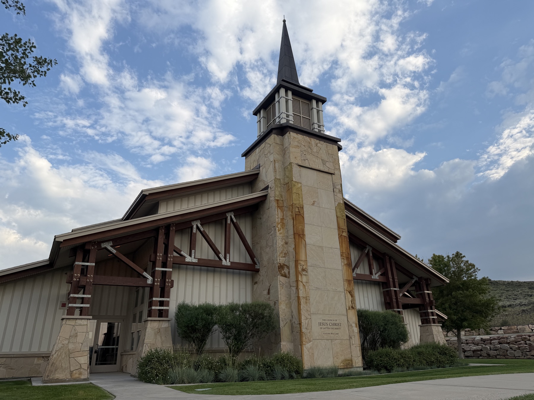 The entrance of the Snyderville meetinghouse below its sandstone tower and steeple